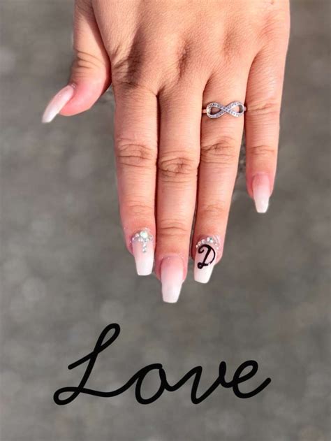 Initial nail ideas - Acrylic nails with boyfriend initials is a cute and simple gesture to show your significant other that you love them and you care. If you love to follow trends then you need to try this out. It is cool. I selected 20 adorable boyfriend initial nails that will inspire you. You don’t need to wait till Valentine’s day before put his initials ...